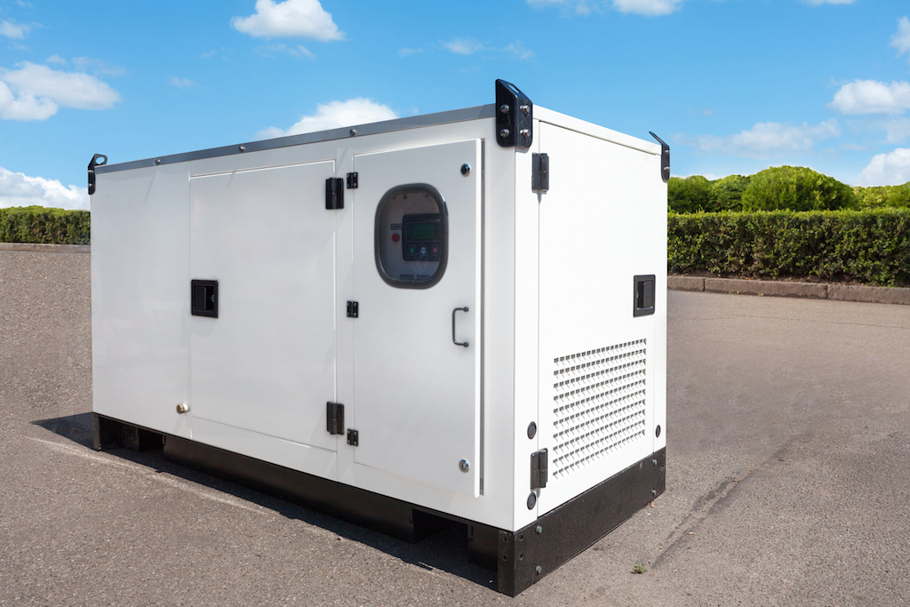 Industrial Diesel Generator outside of office building. | Commercial Generator Service